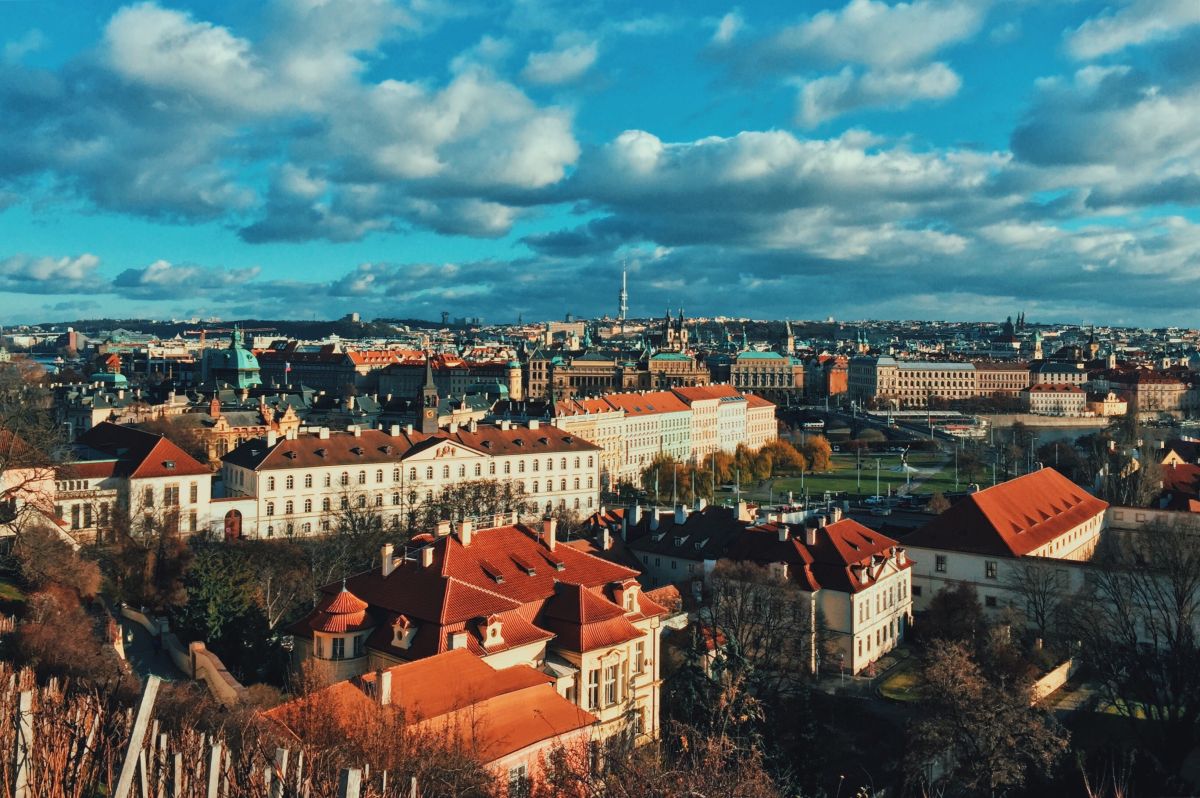 View Of Cityscape Against Cloudy Sky