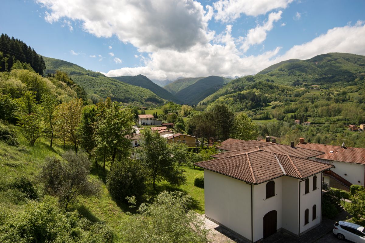 Buildings and mountains close to Castelnuovo di Garfagnana in Lucca, Tuscany.